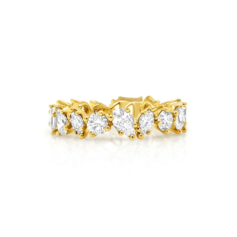 The iconic multi shape diamond eternity band in yellow gold