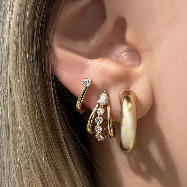 Triple Huggie earrings