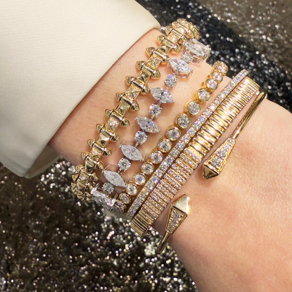 Yellow Gold trillion bangle in rose gold