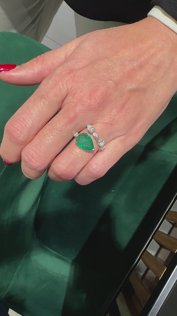 Important Spiral Emerald Ring